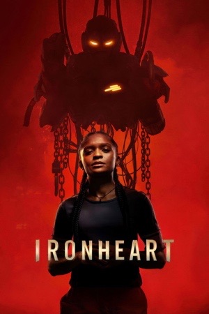 Dominique Thorne in front of a huge red mechanical head with glowing yellow eyes.